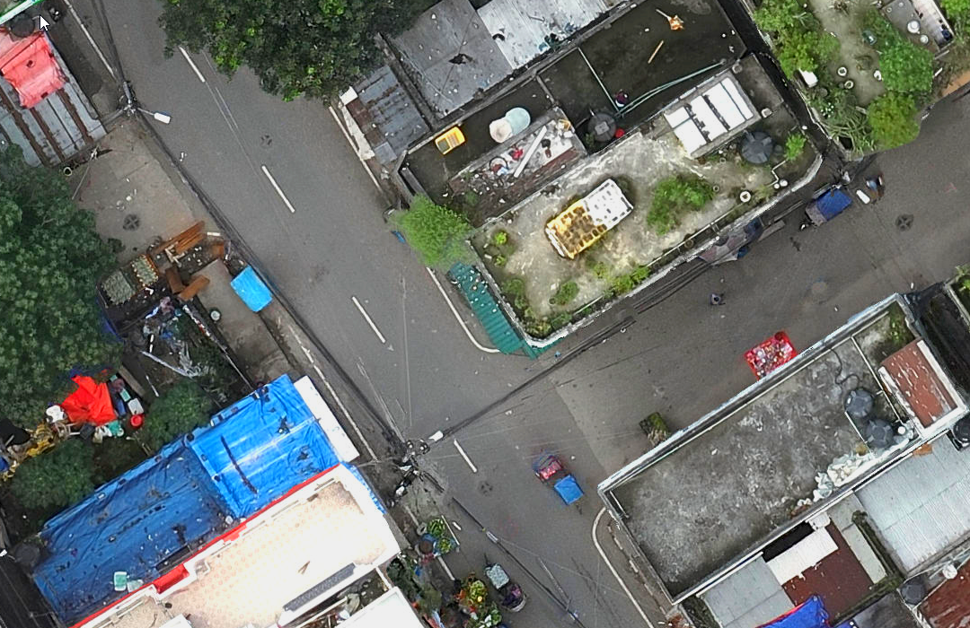 Example of aerial (|UAV|) imagery with visible manholes